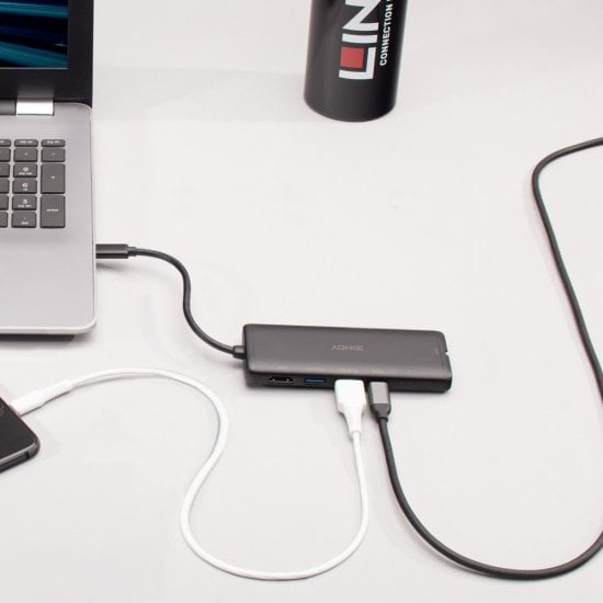 DST-Mini USB-C Laptop Mini Docking Station with 4K Support and 100W Pass-Through Charging DST-Mini USB-C Laptop Mini Docking Station with 4K Support and 100W Pass-Through Charging